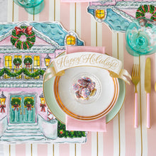 Load image into Gallery viewer, Hester &amp; Cook Happy Holidays Banner Table Accent on a pink and blue holiday table 
