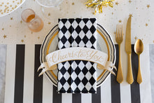 Load image into Gallery viewer, Hester &amp; Cook Cheers to You Banner Table Accent  on a black and gold table setting 
