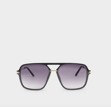 Load image into Gallery viewer, A pair of aviator-style sunglasses with a thick black frame, gold metal accents at the hinges, and gradient purple-tinted lenses, shown against a light gray background.
