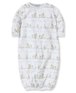 Long baby gown with long sleeves, snaps down the front and gathered hem