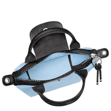 Load image into Gallery viewer, Longchamp Le Pliage Energy X-Small Top Handle Bag in sky blue open to show blue interior 
