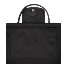 Load image into Gallery viewer, Close up of the Longchamp Le Pliage Energy Recycled Canvas Top Handle Bag  Small  Black
