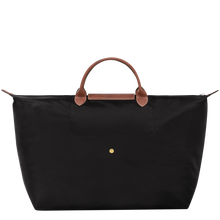 Load image into Gallery viewer, Longchamp Le Pliage Original Large Luggage Travel Bag in black - back view showing center snap used when bag is folded 
