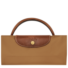 Load image into Gallery viewer, Longchamp Le Pliage Original Large Luggage Travel Bag  in fawn folded and snapped closed
