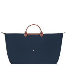 Load image into Gallery viewer, Longchamp Le Pliage Original X-Large Travel Bag in navy with brown leather trimming and center handles back view showing snap used to fold the bag
