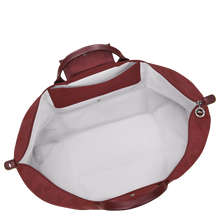 Load image into Gallery viewer, Longchamp Le Pliage Green X-Large Canvas Travel Bag - Pomegranate showing the white interior 
