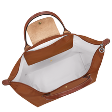 Load image into Gallery viewer, Longchamp Le Pliage Original L Top Handle Bag in brown with brown leather handles and zipper open to show white interior 
