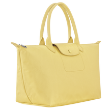 Load image into Gallery viewer, Longchamp Le Pliage One L Top handle Bag Handbag line yellow with matching leather handles and a center flap side view showing the width
