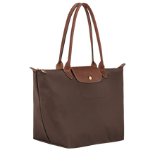 Load image into Gallery viewer, Mocha colored Le Pliage Original shoulder bag with leather accents and gold hardware side view to show width
