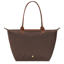 Load image into Gallery viewer, Longchamp Le Pliage Original Large Shoulder Tote Bag in the color mocha with brown leather handles and flap and gold hardware back of the purse with the gold snap near the bottom center of the back
