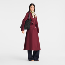 Load image into Gallery viewer, person holding the Longchamp Le Pliage One L Shoulder Bag Handbag in black under her shoulder
