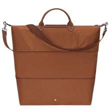 Load image into Gallery viewer, Fully expanded Longchamp Le Pliage Travel Bag Expandable in Cognac canvas and brown leather accents
