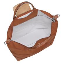 Load image into Gallery viewer,  Longchamp Le Pliage  Travel Bag Expandable in Cognac open to show white interior 
