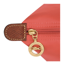 Load image into Gallery viewer, Longchamp Le Pliage Original Medium Shoulder Bag in a pink strawberry color close up on gold zipper pull with. Longchamp logo and textured leather 
