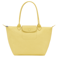 yellow bag with matching yellow leather center flap and shoulder straps