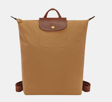 Load image into Gallery viewer, Longchamp Le Pliage Original Backpack - Medium in the color fawn with brown leather and gold hardware
