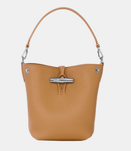 Load image into Gallery viewer, Tan Longchamp Le Roseau Crossbody X-Small Bucket Bag with silver color hardware

