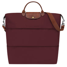 Load image into Gallery viewer, Longchamp Le Pliage Green Travel Bag Expandable in Burgundy maroon canvas and brown leather accents and gold colored hardware
