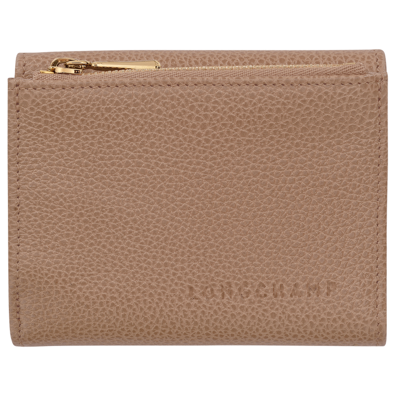 tan wallet with gold zipper