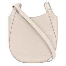 Load image into Gallery viewer, cream colored bag with short side handles  and cross body strap 
