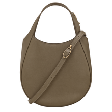 Load image into Gallery viewer, Longchamp Le Foulonné Leather Top Handle Handbag in the color caper with a gold buckle on the top handle and the adjustable cross body strap
