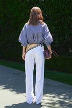 Load image into Gallery viewer, bac kview of the Striped Balloon Sleeve Shirt  with loose gathered fabric 
