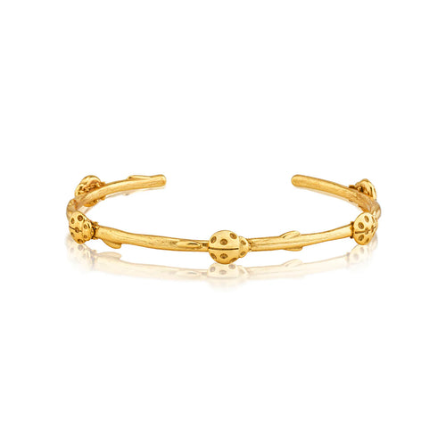 thin gold bangle with gold lady bugs