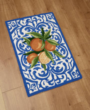Load image into Gallery viewer, Mediterranean Oranges Hook Rug on a floor
