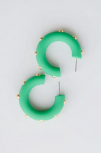 Load image into Gallery viewer, Green curved hoop earrings with small gold studs, displayed on a light gray background.
