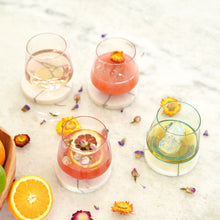 Load image into Gallery viewer, Mezclada Stemless Glass - Set of 4 filled on a table
