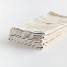 Load image into Gallery viewer, Avery taupe cloth Napkins in a stack showing the edge stitching 
