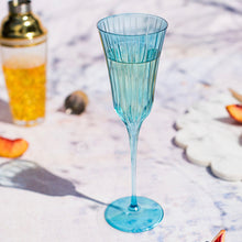 Load image into Gallery viewer, Vietri Natalia Teal Champagne Glass on a table
