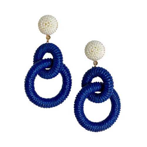 earrings with two navy blue colored Raffia loops dangling from a circle of tiny pearl beads