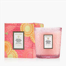 Load image into Gallery viewer, Voluspa Nāpali Passion Fruit Classic Candle - 9.5 oz candle in pink glass next to patterned box
