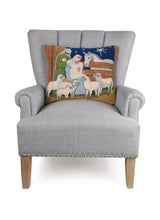 Load image into Gallery viewer, Nativity Hook Pillow on a chair
