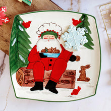 Load image into Gallery viewer, Vietri Old St. Nick 2025 Limited Edition SquareVietri Old St. Nick 2025 Limited Edition Square Platter with Santa feeding cookies to rabbits and birds Platter

