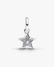 Load image into Gallery viewer, Silver star-shaped pendant on a white background
