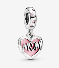 Load image into Gallery viewer, A silver-colored heart-shaped dangle charm with a 'Mom' script in the center, featuring pink and red accents.
