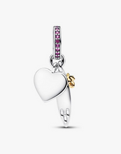 Load image into Gallery viewer, Heart-shaped charm with pink stones on a white background
