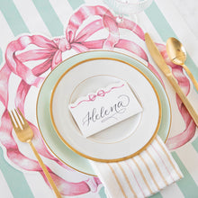 Load image into Gallery viewer, Hester &amp; Cook Pink Bow Die-Cut Placemat on table setting
