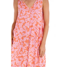 Load image into Gallery viewer, woman in a orange and pink floral dress with button up the front
