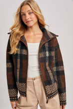 Load image into Gallery viewer, person wearing the Plaid Fuzzy Knit Sweater Jacket in shades of mocha
