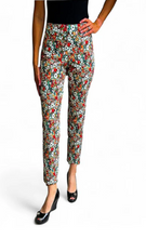 Load image into Gallery viewer, Woman wearing colorful floral pants on a white background
