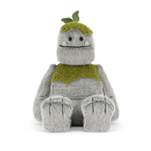 Load image into Gallery viewer, Plush toy with block 'bolder' shaped  features, arms and legs with green 'moss' on its head and shoulders front view showing face with wide mouth and two teeth
