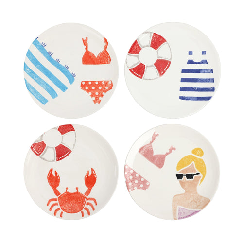 Four plates with colorful painting if bathing suits, people crabs towels and other beach items