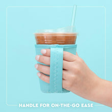 Load image into Gallery viewer, person holding Swig Iced Cup Coolie graphic with text handle for on the go ease
