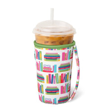 Load image into Gallery viewer, Swig Book Club Iced Cup Coolie holding a iced coffee cup showing holder 
