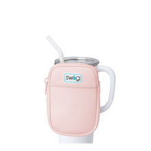 Load image into Gallery viewer, small zipper pouch with pink fabric on a travel tumbler 
