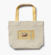 Load image into Gallery viewer, Rifle Paper East West Canvas Tote Bag with an image of a block of butter

