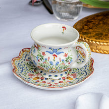 Load image into Gallery viewer, Juliska Sofia Mug Multi with saucer on table
